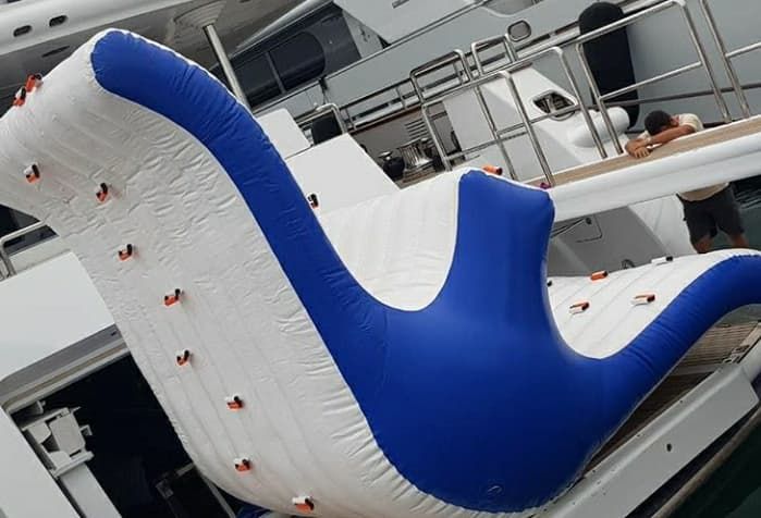 Inflatable swing-slide